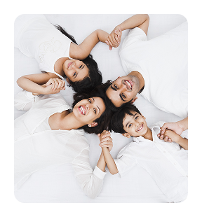 Happy family receiving healthcare at Al Shumoos Medical Centre